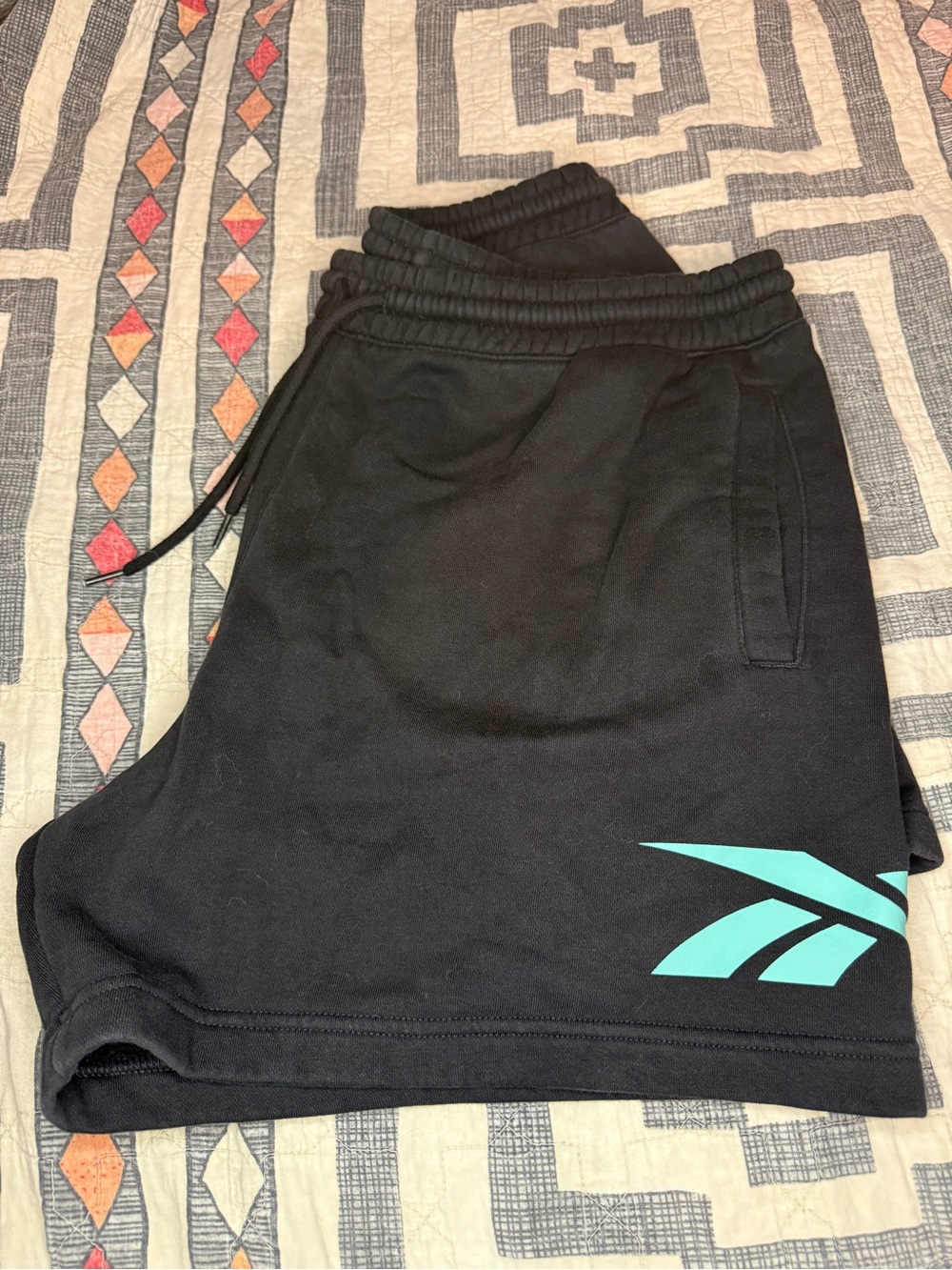 Reebok Black Shorts with Teal Accent Logo